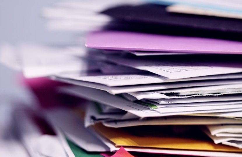 Photo by Alexander Grey pile of printing papers
